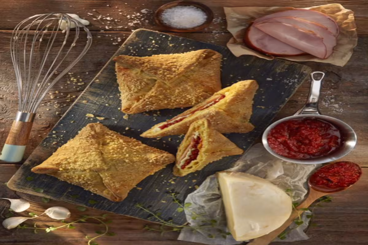 Handmade portion size pie with ham and chee