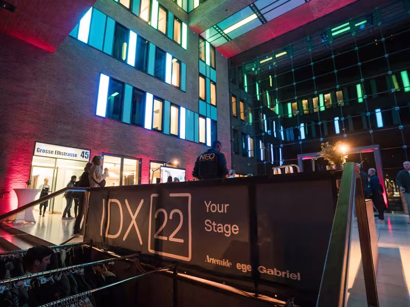 Artemide and Ege Carpets Illuminate IDX with Innovative Lighting and Design