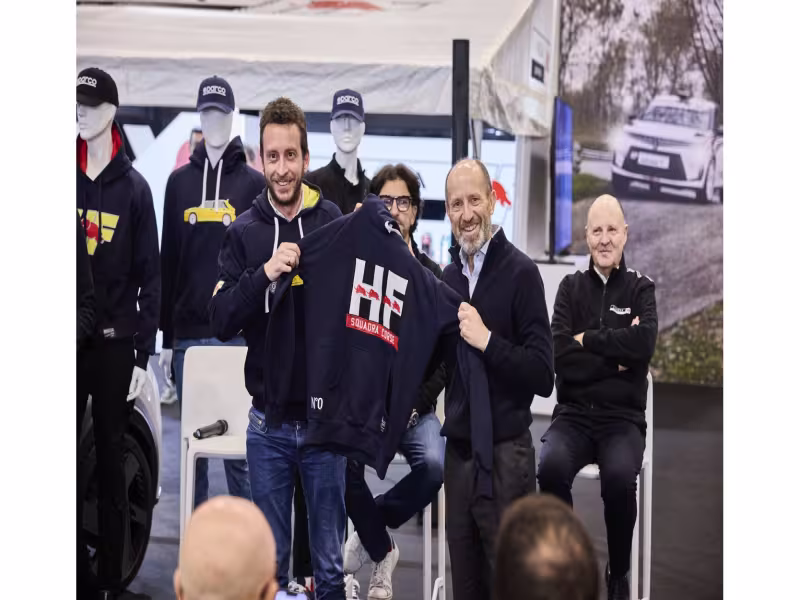The HF Look is Back in Style: The New Lancia and Sparco Co-branded Sportswear Line Introduced at the “Rally Racing Meeting”