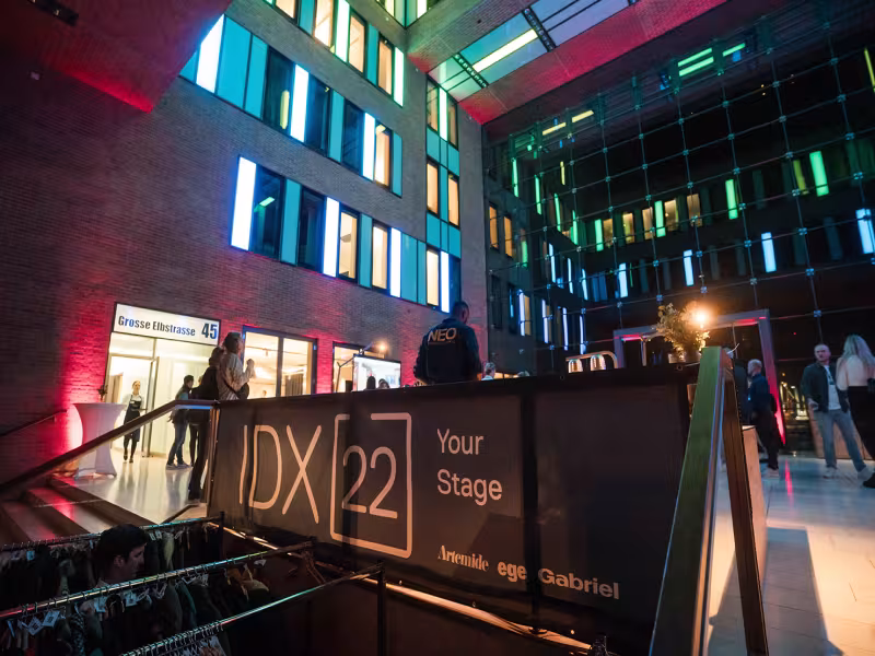 Artemide and Ege Carpets Illuminate IDX with Innovative Lighting and Design