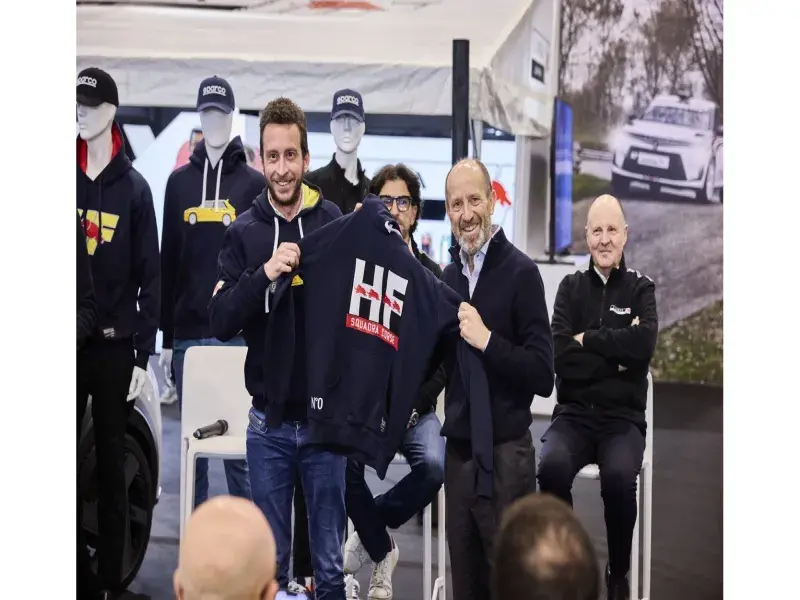 The HF Look is Back in Style: The New Lancia and Sparco Co-branded Sportswear Line Introduced at the “Rally Racing Meeting”