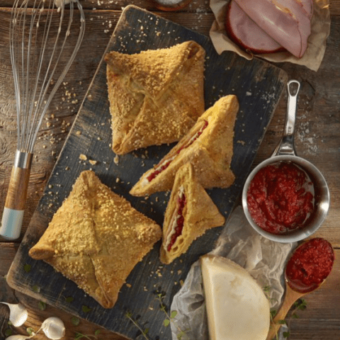 Handmade portion size pie with ham and chee