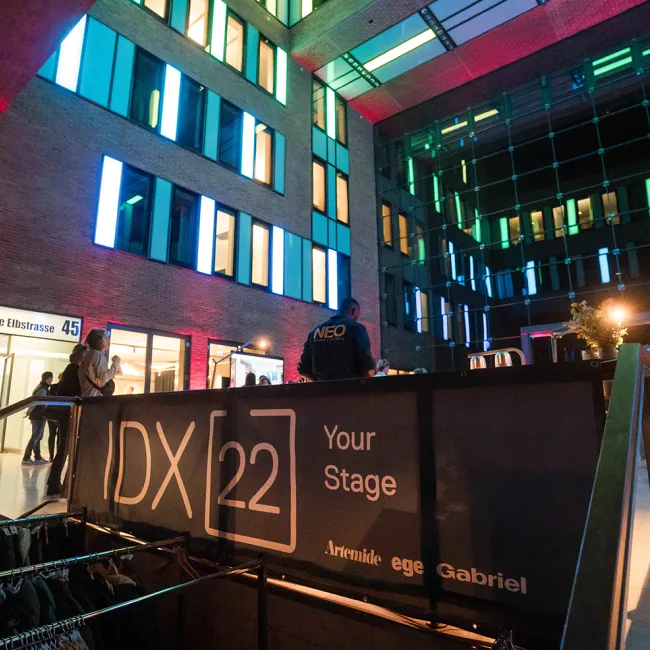Artemide and Ege Carpets Illuminate IDX with Innovative Lighting and Design