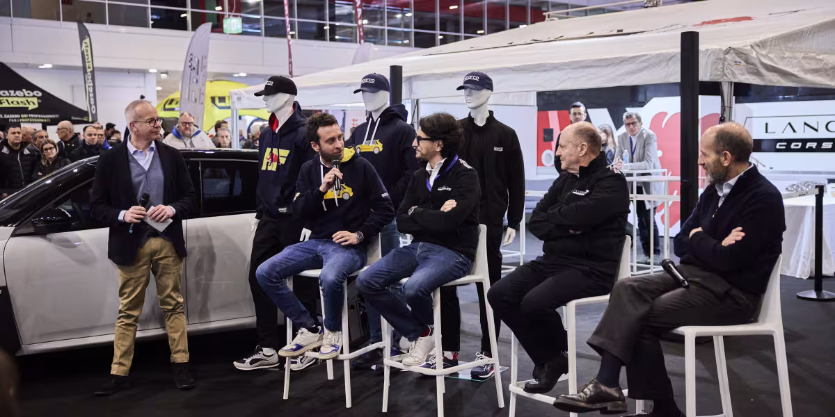 The HF Look is Back in Style: The New Lancia and Sparco Co-branded Sportswear Line Introduced at the “Rally Racing Meeting”