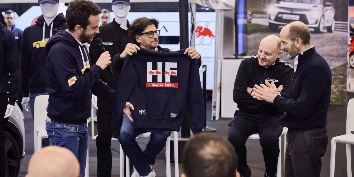 The HF Look is Back in Style: The New Lancia and Sparco Co-branded Sportswear Line Introduced at the “Rally Racing Meeting”