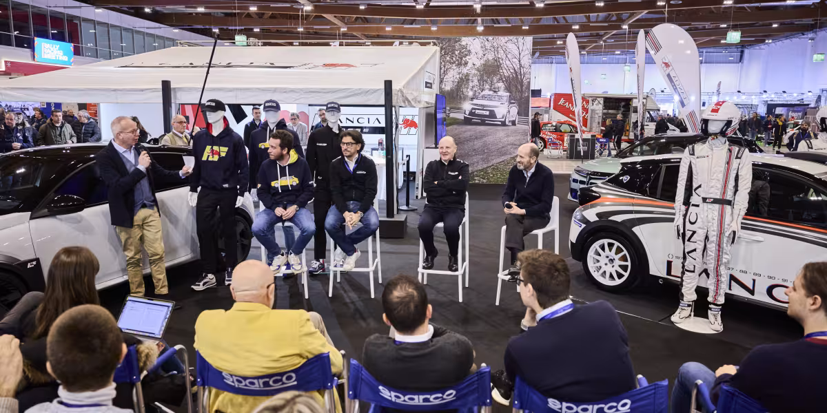 The HF Look is Back in Style: The New Lancia and Sparco Co-branded Sportswear Line Introduced at the “Rally Racing Meeting”