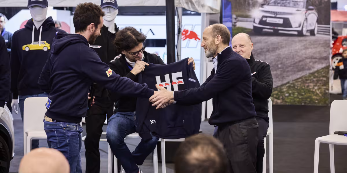 The HF Look is Back in Style: The New Lancia and Sparco Co-branded Sportswear Line Introduced at the “Rally Racing Meeting”