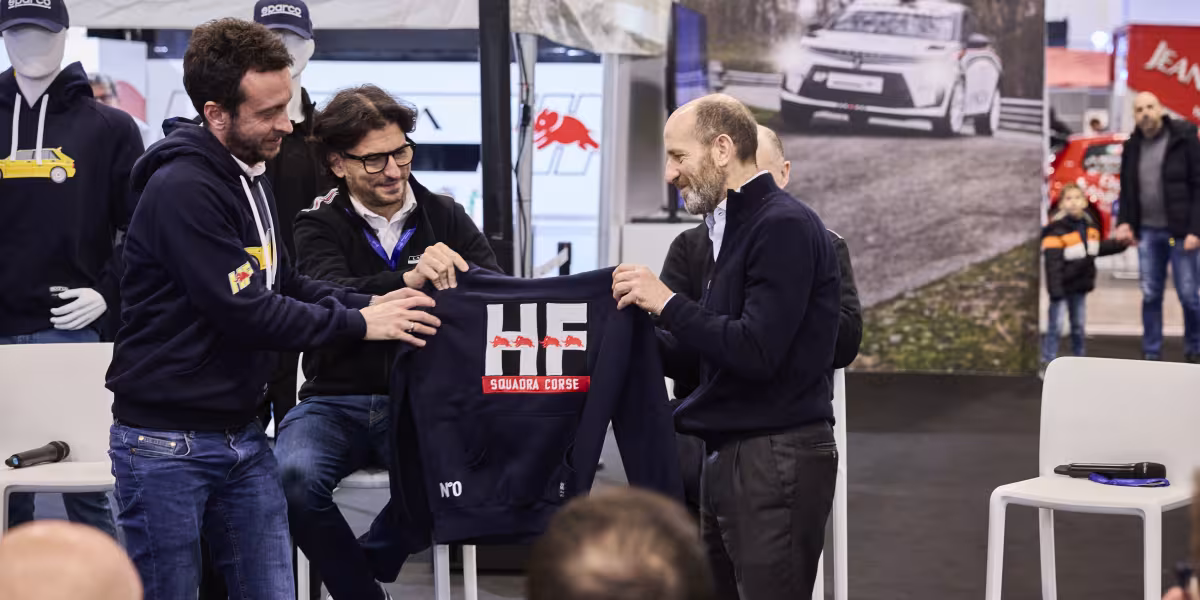 The HF Look is Back in Style: The New Lancia and Sparco Co-branded Sportswear Line Introduced at the “Rally Racing Meeting”